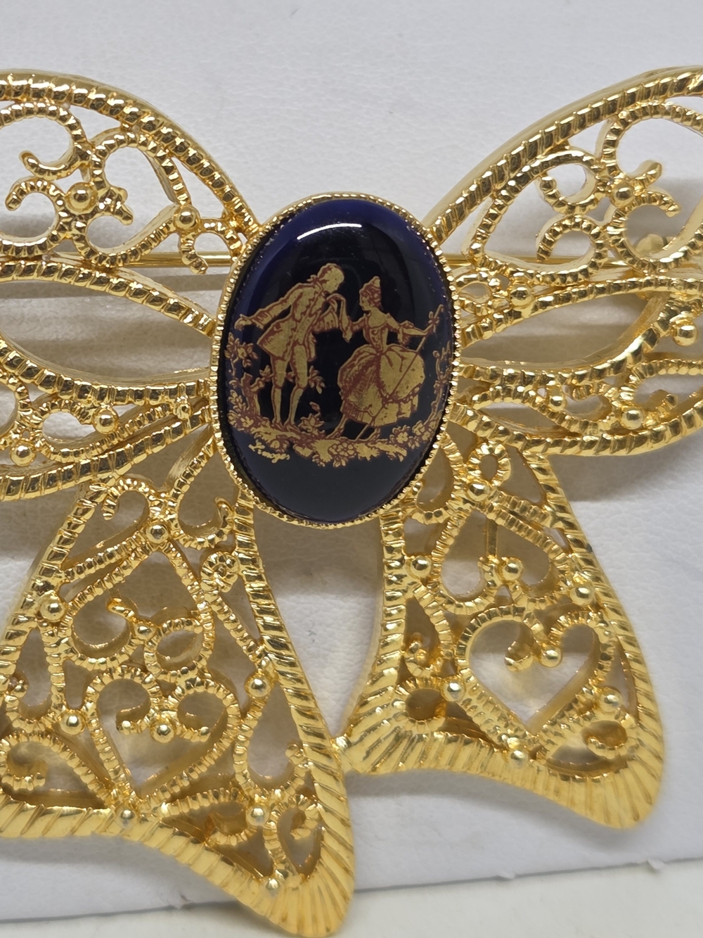 Gold-Tone Filigree Vintage Bow Brooch with Navy Limoges Cameo